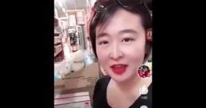 CHINESE WOMAN BUYING UP ALL THE MASKS SHE CAN