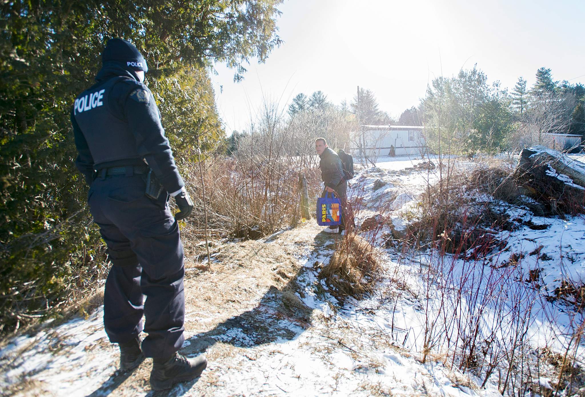 Man crosses illegally into Canada from U.S. at Roxham Road in Que., two days before Azizov family, March 5, 2017. THE CANADIAN PRESS IMAGES/Graham Hughes
