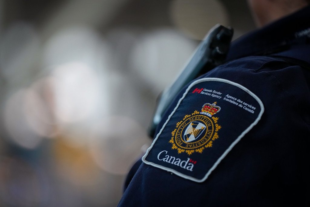 A Canada Border Services Agency patch is seen on the uniform of a CBSA officer at Vancouver International Airport, in Richmond, B.C., on Friday, October 3, 2025. THE CANADIAN PRESS/Darryl Dyck.